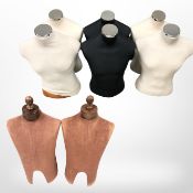 Eight various mannequin torsos