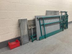 A galvanised metal disability access ramp, approximate length 3.2m, Width 1m, rail height 96 cm.