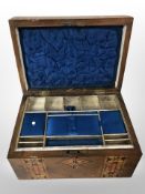A Victorian walnut and parquetry-inlaid sewing box with compartmentalised interior, width 25cm.