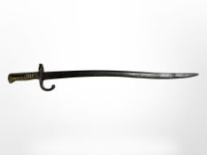 A French M 1866 Chassepot sword bayonet with brass hilt, blade 57cm.
