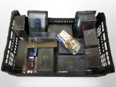 A group of scale model die cast vehicles including military tanks,