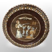 An Egyptian Revival inlaid hardwood charger, diameter 35cm.