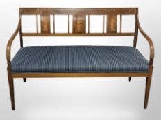 An early 20th century mahogany and satinwood inlaid salon settee,