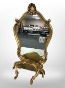A reproduction gilt mirror height 77 cm,