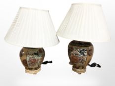 A pair of 20th century Japanese export ceramic lamp bases with shades,