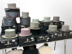Fifteen Gent's felt top hats in carry cases