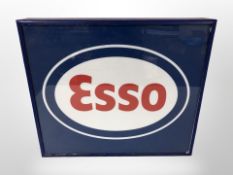 An Esso illuminated sign,