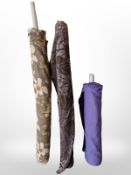 Three rolls of upholsterer's fabric / material, width approximately 140 cm, length unknown.