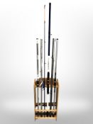 A Umax fishing rod stand containing an Okuma Wave Power three-piece rod,