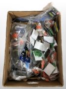 A box containing a large quantity of new fishing equipment including carp beads, rod rest,