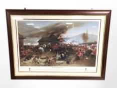 A colour print depicting the battle of Rorke's drift in decorative carved framed,