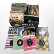 A quantity of vinyl 7-inch singles including Paul McCartney, The Beatles, etc.