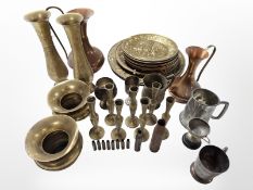 A quantity of brass chargers, candlesticks, vases, other copper and pewter wares.
