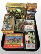 A group of figurines and miniatures including Arcane Legions, The Hobbit, Star Wars,