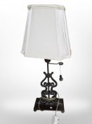 A contemporary patinated metal table lamp,