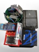 A collection of new fishing equipment, in retail condition, including lures, bass sticks,