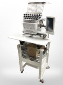 An Acetex 1501TSX industrial embroidery machine
