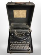 A Remington noiseless portable typewriter in case