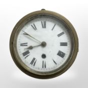 An oak and brass circular ship's timepiece,