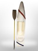 A fibre glass kayak,