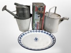 A group of galvanised and enamelled watering cans, bucket, tin, oval tray,