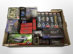 A group of Marvel DVD box sets, die cast cars,