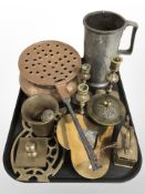 A group of brass candlesticks, pestle and mortar, a large 19th-century pewter tankard,