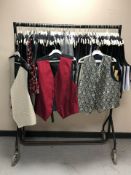 A rail of Gent's waistcoats, various sizes.
