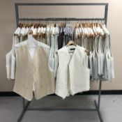 A rail of Gent's waistcoats, various sizes.