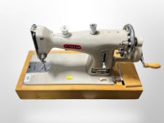 A Sunbeam hand sewing machine.