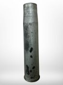 A large shell case, height 62cm.