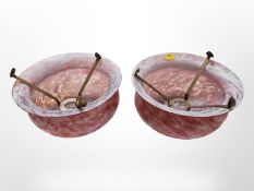 A pair of Art Deco mottled pink glass light shades, diameter 23cm.