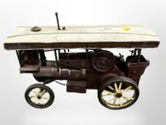 A tin plate model of a steam engine,