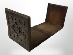 A Victorian carved oak folding book stand,