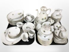 A large quantity of Bing & Grøndahl porcelain tea and dinner wares decorated with flowers on white