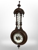 A walnut barometer.