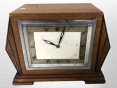 An Art Deco walnut mantle clock,