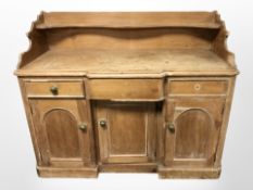 A Victorian pine sideboard,