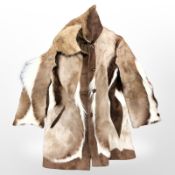 A brown suede and deer skin jacket.