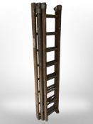 A wooden extending ladder