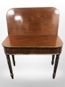 A 19th century mahogany tea table