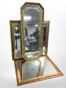 Three reproduction gilt mirrors, largest 101cm long.