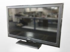 A Sony Bravia 40 inch lcd tv with lead and remote