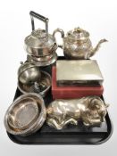 A silver-plated spirit kettle on burner, further teapot, bottle coasters,