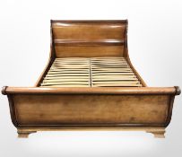 A contemporary hardwood 5' sleigh bed,