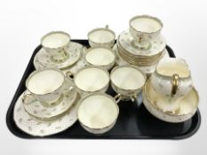 26 pieces of Paragon Peacock tea china.