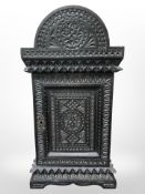 A 19th century ebonised poker work key cabinet,