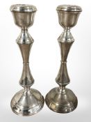 A pair of loaded silver candlesticks, Sheffield marks, height 21cm.