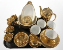 32 pieces of Royal Winton gilded tea and dinner porcelain.