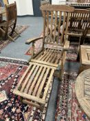 A plantation teak folding garden steamer chair, width 64.5cm.